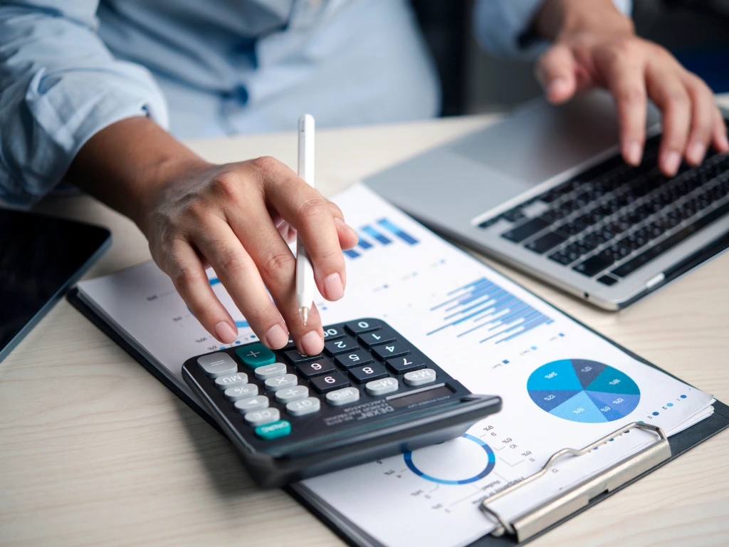 A person doing calculation on tax and bookkeeping